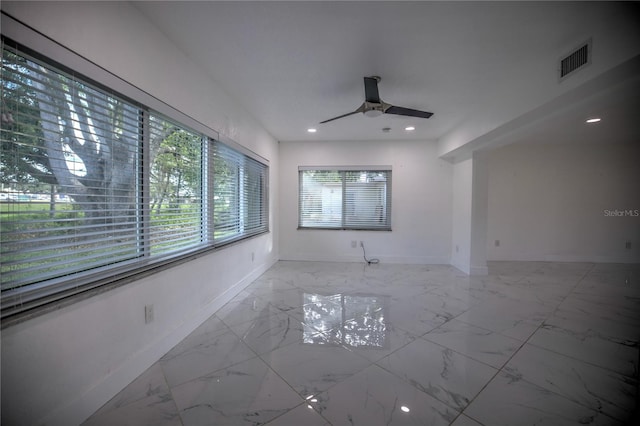 empty room featuring ceiling fan