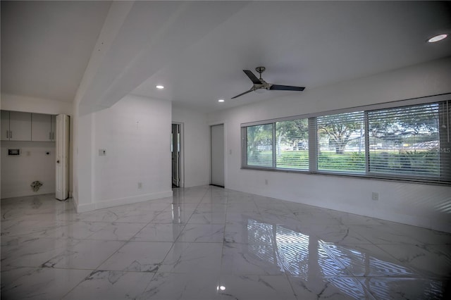 1042 Idlewild Dr N, Dunedin, FL 34698 - spare room with light marble finish floors, baseboards, recessed lighting, and ceiling fan