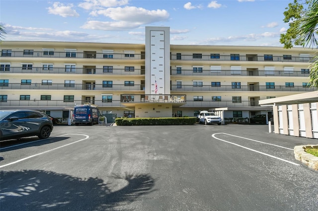 8198 Terrace Garden Dr N Unit 403, Saint Petersburg, FL 33709 - view of apartment building / complex featuring uncovered parking