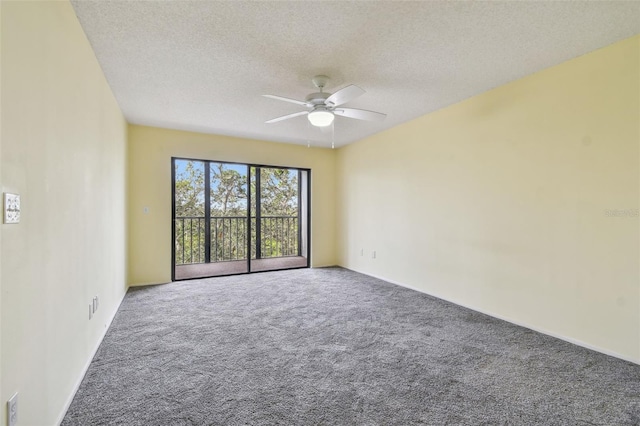 unfurnished room featuring carpet flooring, a textured ceiling, and ceiling fan