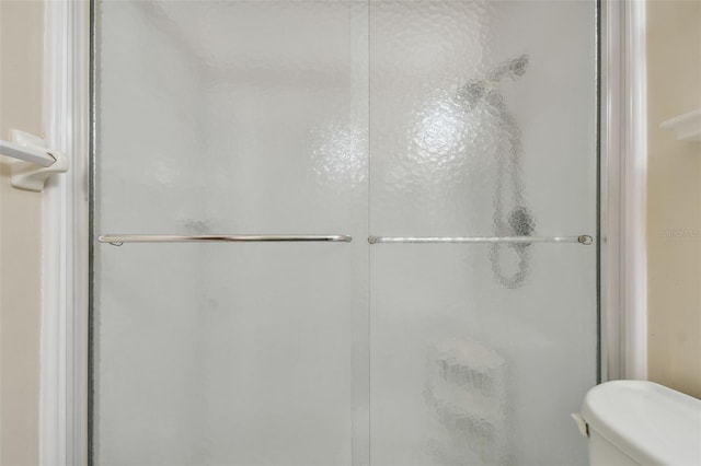 8198 Terrace Garden Dr N Unit 403, Saint Petersburg, FL 33709 - full bathroom with a shower stall and toilet