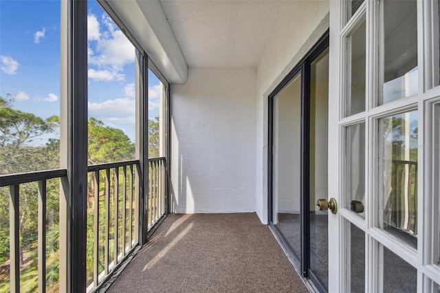 unfurnished sunroom with a wealth of natural light