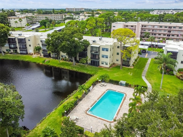 8198 Terrace Garden Dr N Unit 403, Saint Petersburg, FL 33709 - drone / aerial view of a large body of water, apartment complex / building, and a pool area