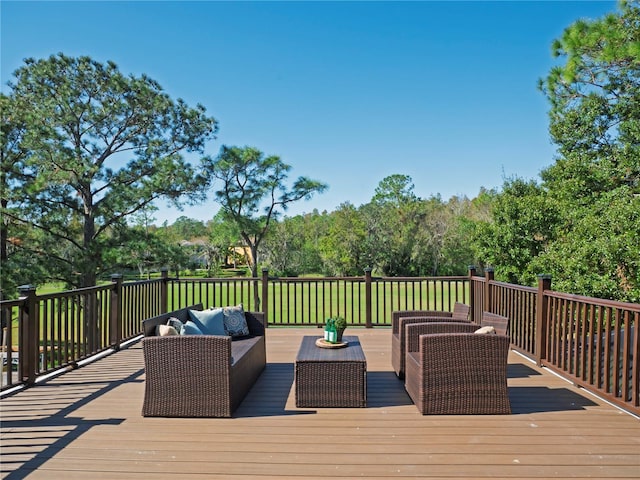 deck featuring outdoor lounge area