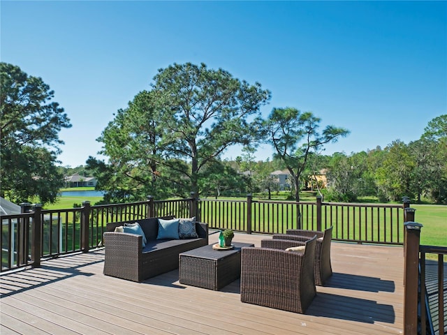 wooden terrace featuring an outdoor hangout area