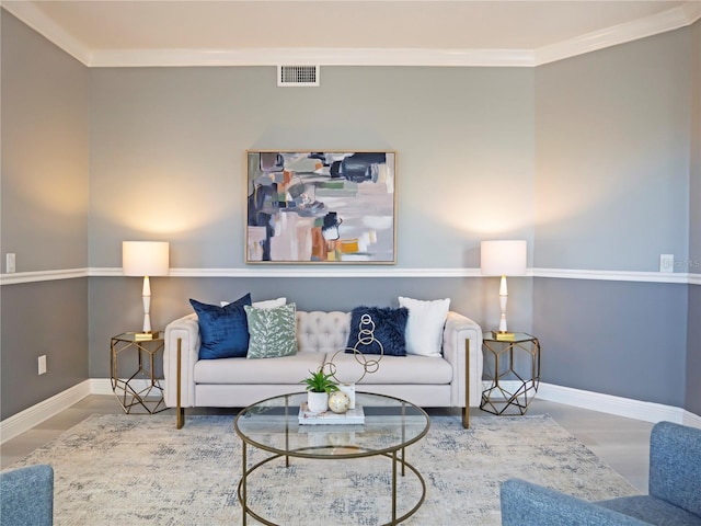 living room featuring crown molding