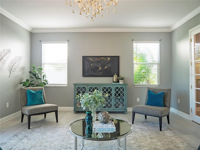 living area featuring an inviting chandelier and ornamental molding