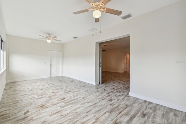 unfurnished room featuring light hardwood / wood-style flooring and ceiling fan