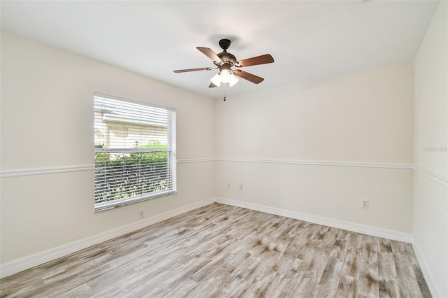 unfurnished room with light hardwood / wood-style floors and ceiling fan