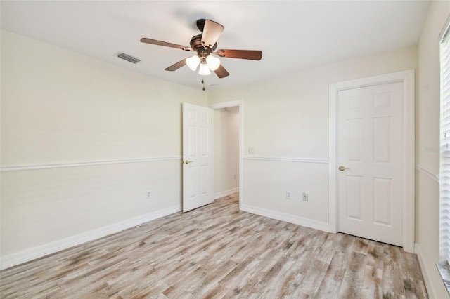 unfurnished bedroom featuring light hardwood / wood-style floors and ceiling fan