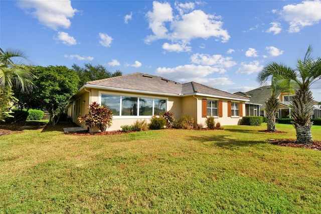 exterior space with a front yard