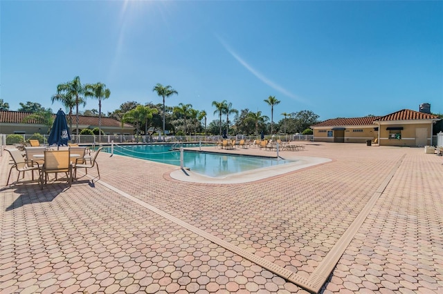 view of swimming pool featuring a patio