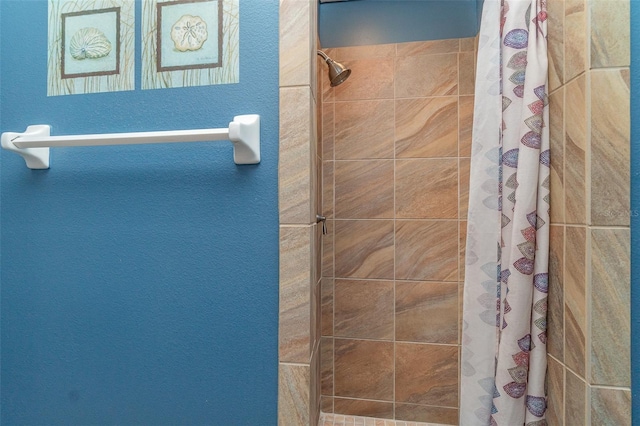 bathroom featuring walk in shower