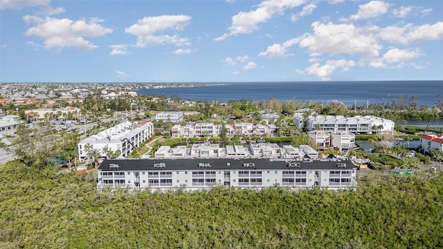 drone / aerial view with a water view