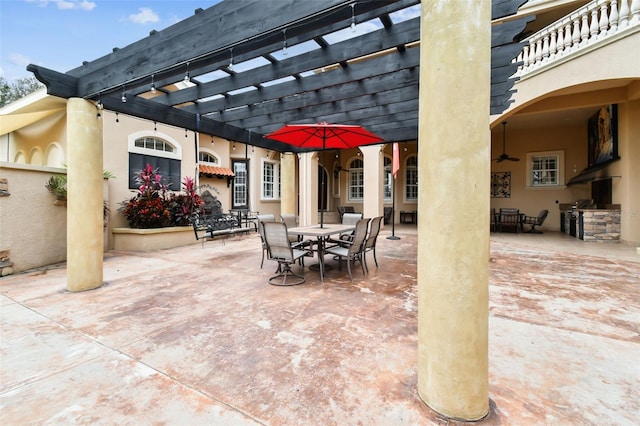 12709 Mannhurst Oak Ln, Lithia, FL 33547 - view of patio / terrace with outdoor dining area, a pergola, and ceiling fan