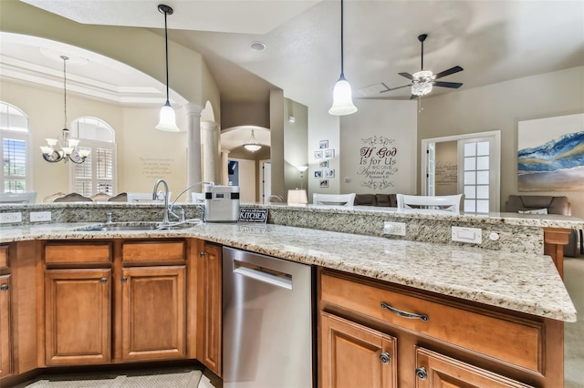 kitchen with dishwasher, brown cabinetry, a sink, and decorative light fixtures