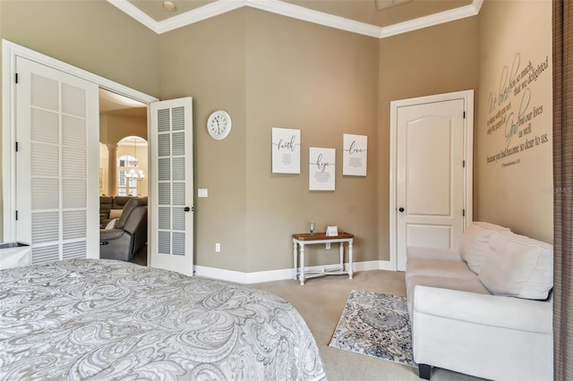 bedroom with light carpet, baseboards, and ornamental molding