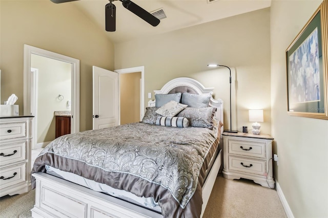 bedroom with light colored carpet, ceiling fan, and lofted ceiling