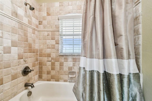 bathroom featuring shower / bathtub combination with curtain