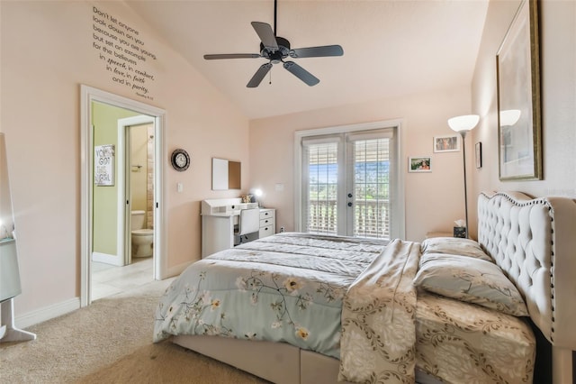 bedroom with lofted ceiling, connected bathroom, light carpet, baseboards, and access to outside