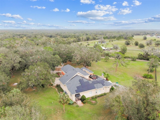 birds eye view of property with a rural view