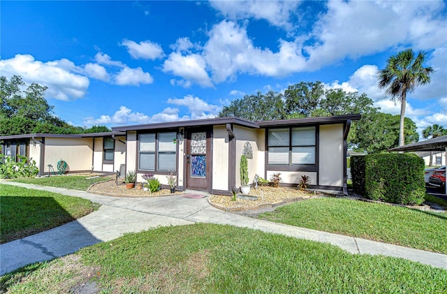 view of front of home with a front yard