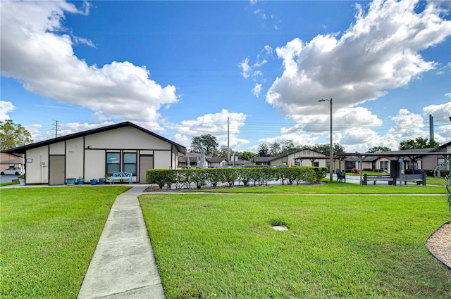 surrounding community featuring a yard