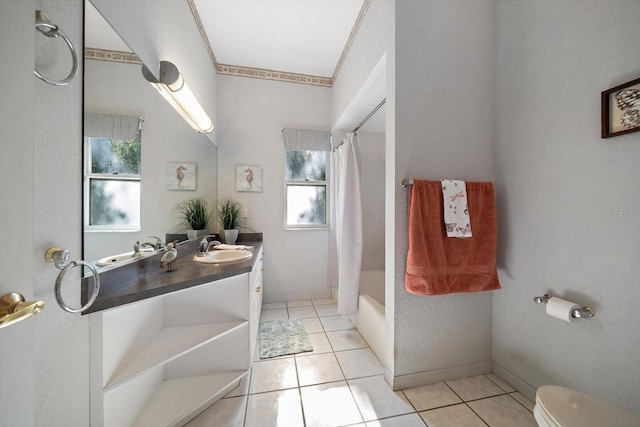 full bathroom with ornamental molding, vanity, shower / tub combo with curtain, tile patterned flooring, and toilet