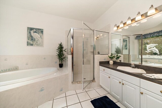 bathroom featuring separate shower and tub, tile patterned flooring, and vanity