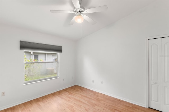 spare room with ceiling fan and light hardwood / wood-style flooring