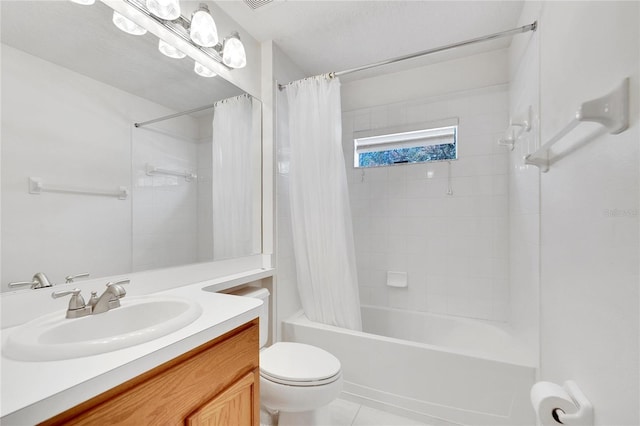 full bathroom with tile patterned floors, vanity, toilet, and shower / tub combo with curtain