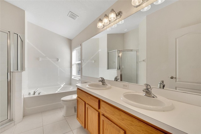 full bathroom with separate shower and tub, tile patterned flooring, vanity, and toilet