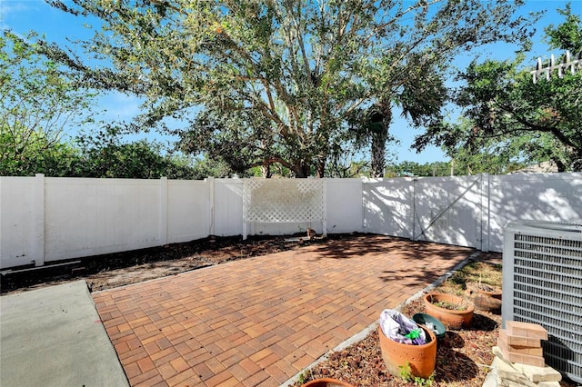 view of patio with central AC unit