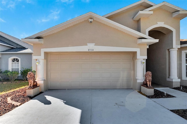 view of front of property featuring a garage