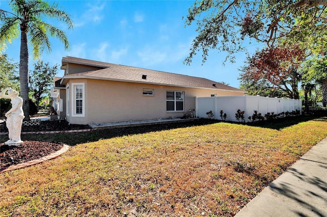 exterior space with a lawn