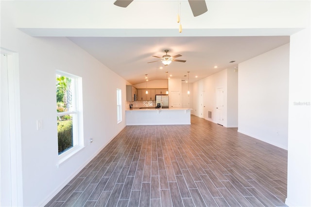 25434 Colon Dr, Punta Gorda, FL 33983 - unfurnished living room with ceiling fan, vaulted ceiling, dark wood finished floors, baseboards, and recessed lighting