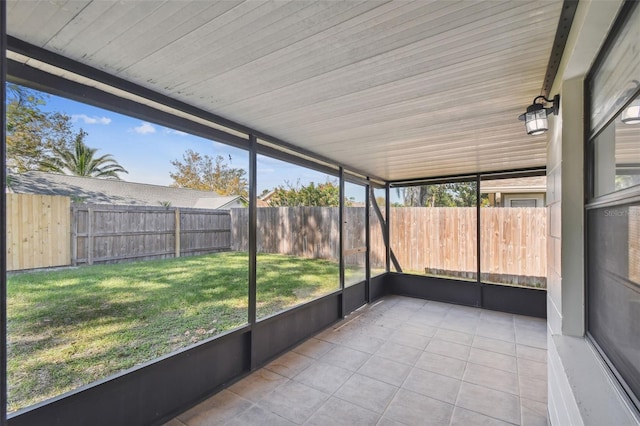 unfurnished sunroom with a wealth of natural light