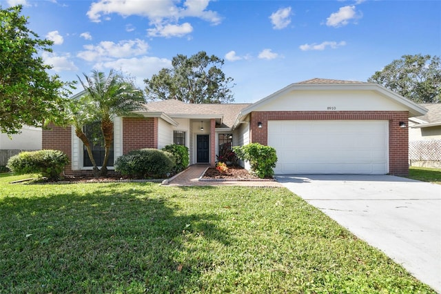 ranch-style house with a front yard and a garage