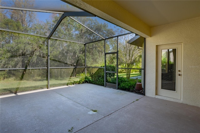 view of patio / terrace with a lanai