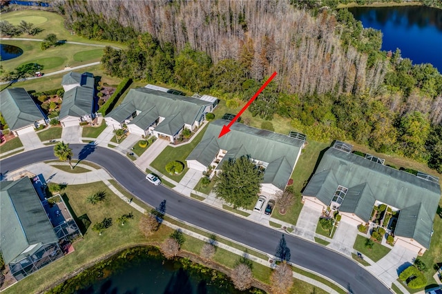 birds eye view of property featuring a water view