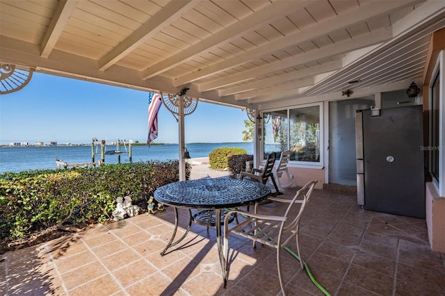 view of patio / terrace with a water view