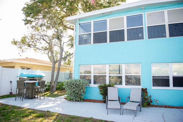 rear view of house with a patio area