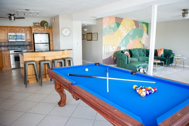 playroom featuring ceiling fan, light tile patterned flooring, and pool table