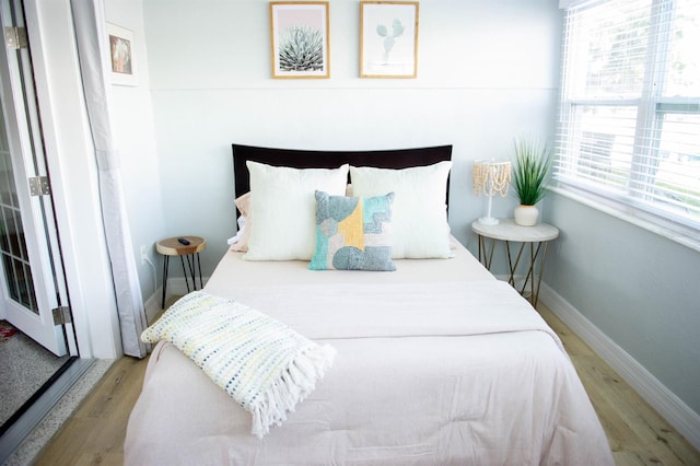 bedroom featuring light wood-type flooring