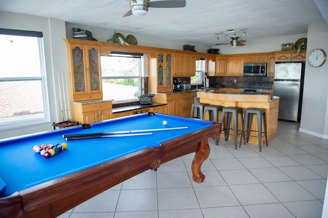 game room featuring light tile patterned floors, sink, ceiling fan, and pool table