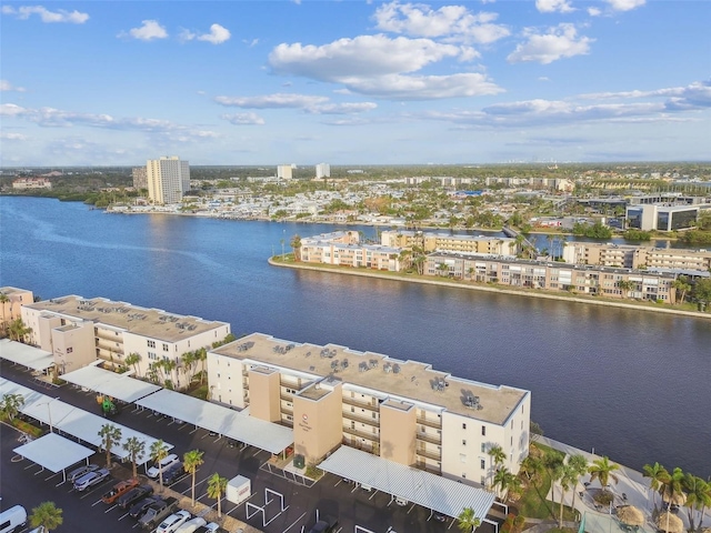 birds eye view of property featuring a water view