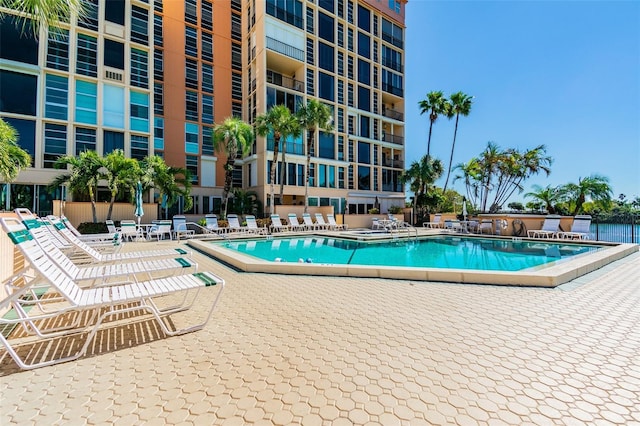 view of pool featuring a patio