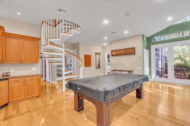 rec room with light hardwood / wood-style floors, a healthy amount of sunlight, and pool table