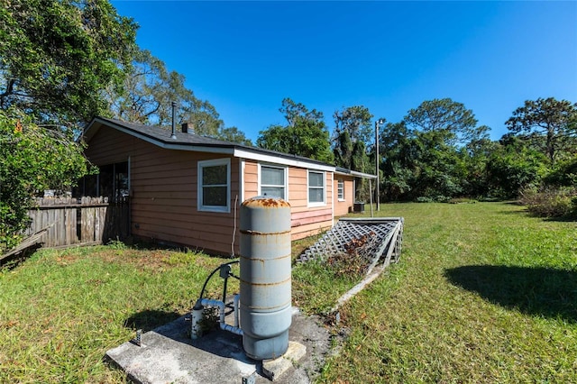 view of outdoor structure with a lawn