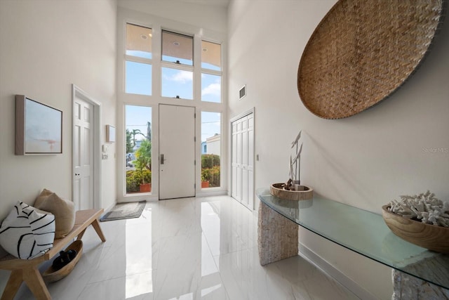 18 Winston Dr, Belleair, FL 33756 - entryway with a high ceiling and light marble finish floors